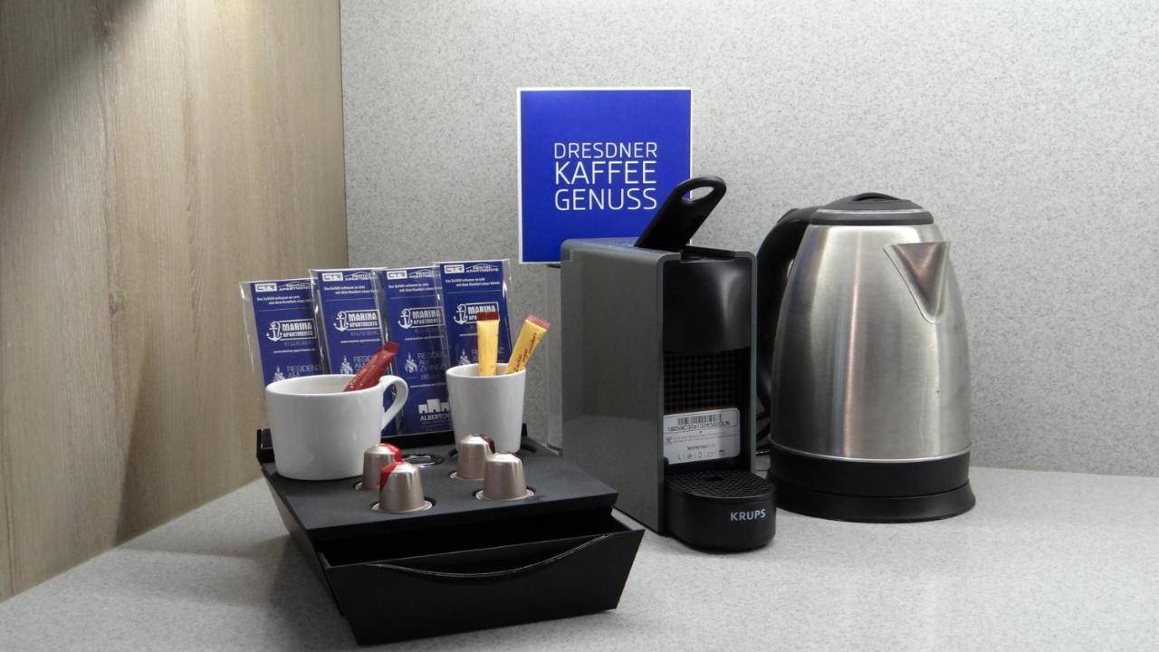 ドレスデン レジデンツ アム ツヴィンガーアパートホテル エクステリア 写真 A Nespresso coffee machine