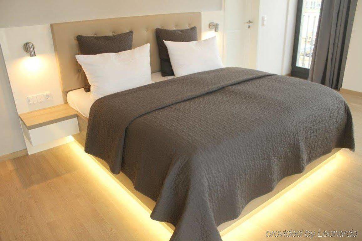 ドレスデン レジデンツ アム ツヴィンガーアパートホテル エクステリア 写真 A modern bedroom