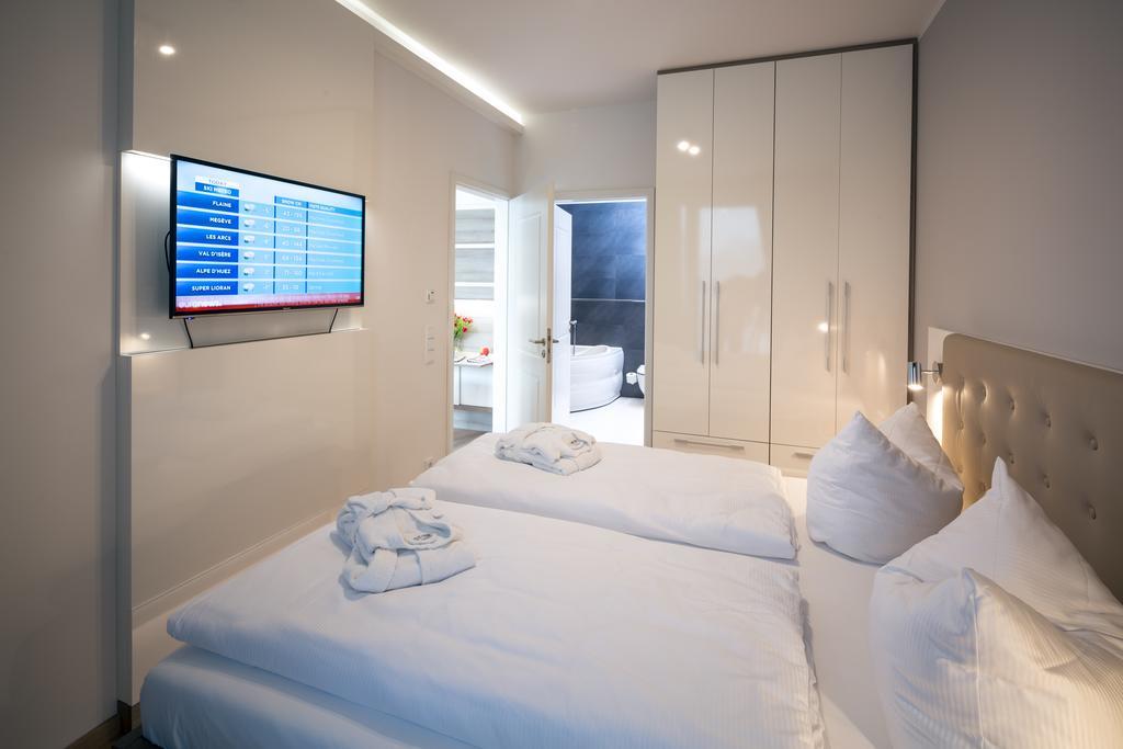 ドレスデン レジデンツ アム ツヴィンガーアパートホテル 部屋 写真 A typical room at the hotel