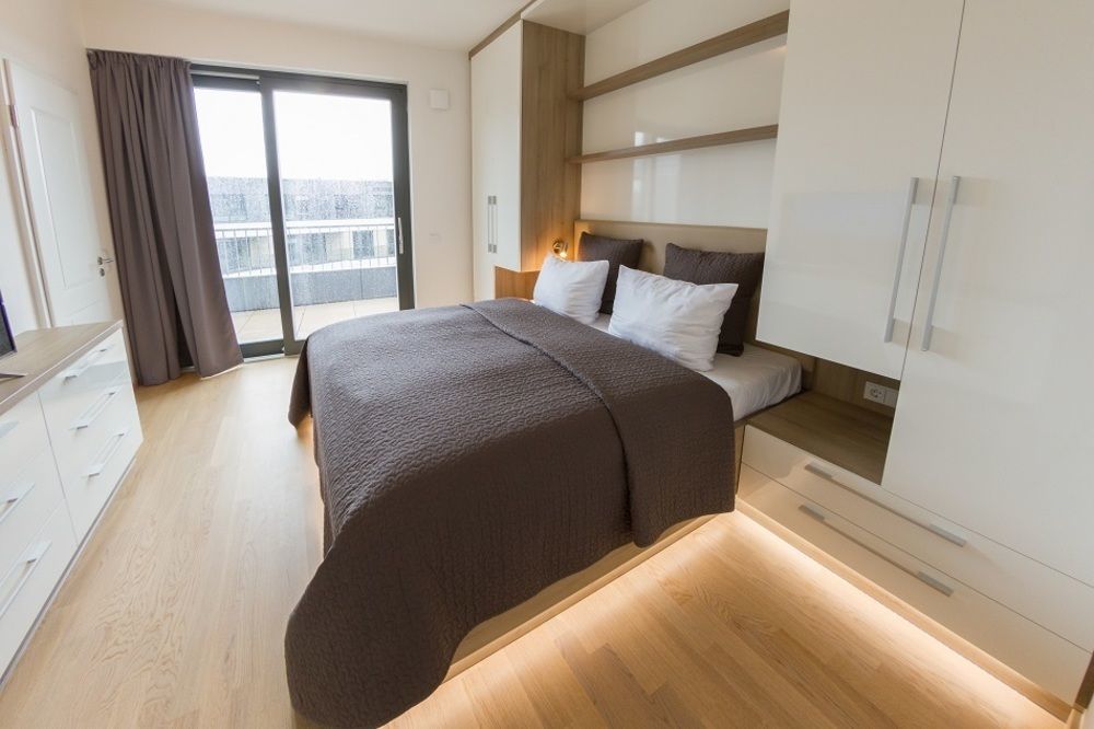 ドレスデン レジデンツ アム ツヴィンガーアパートホテル エクステリア 写真 A bedroom at the hotel