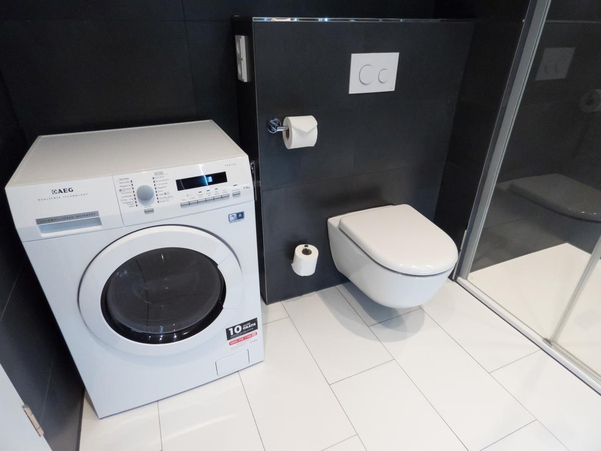 ドレスデン レジデンツ アム ツヴィンガーアパートホテル エクステリア 写真 A modern washing machine